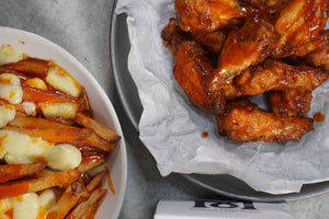 Magical Buffalo Wings with a side Of Magical Poutine