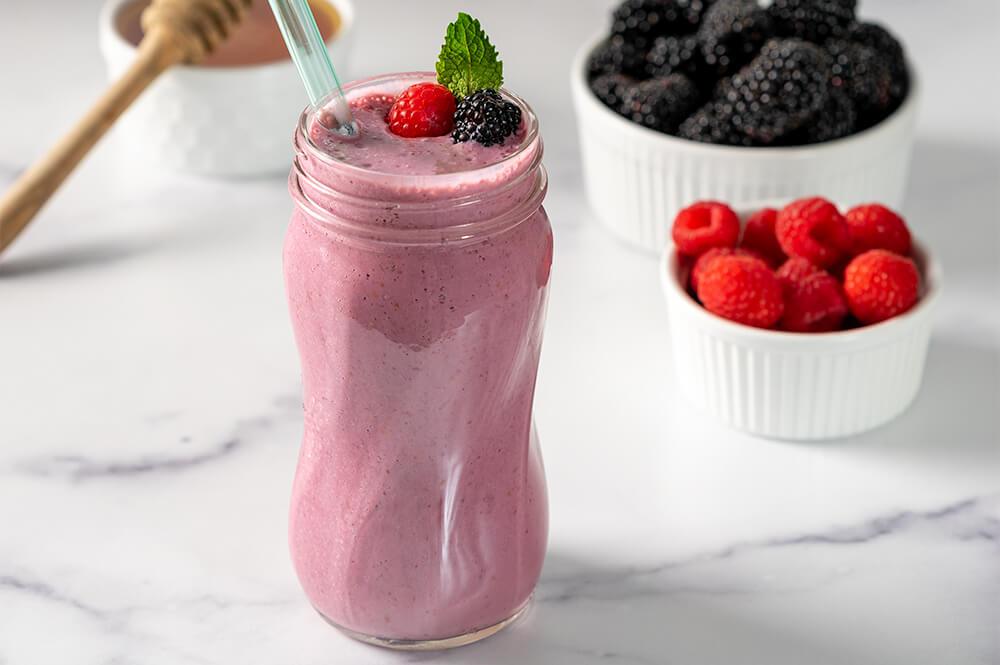 Wild Blackberry Raspberry & Magical Honey Smoothie with Fresh Fruit on Marble